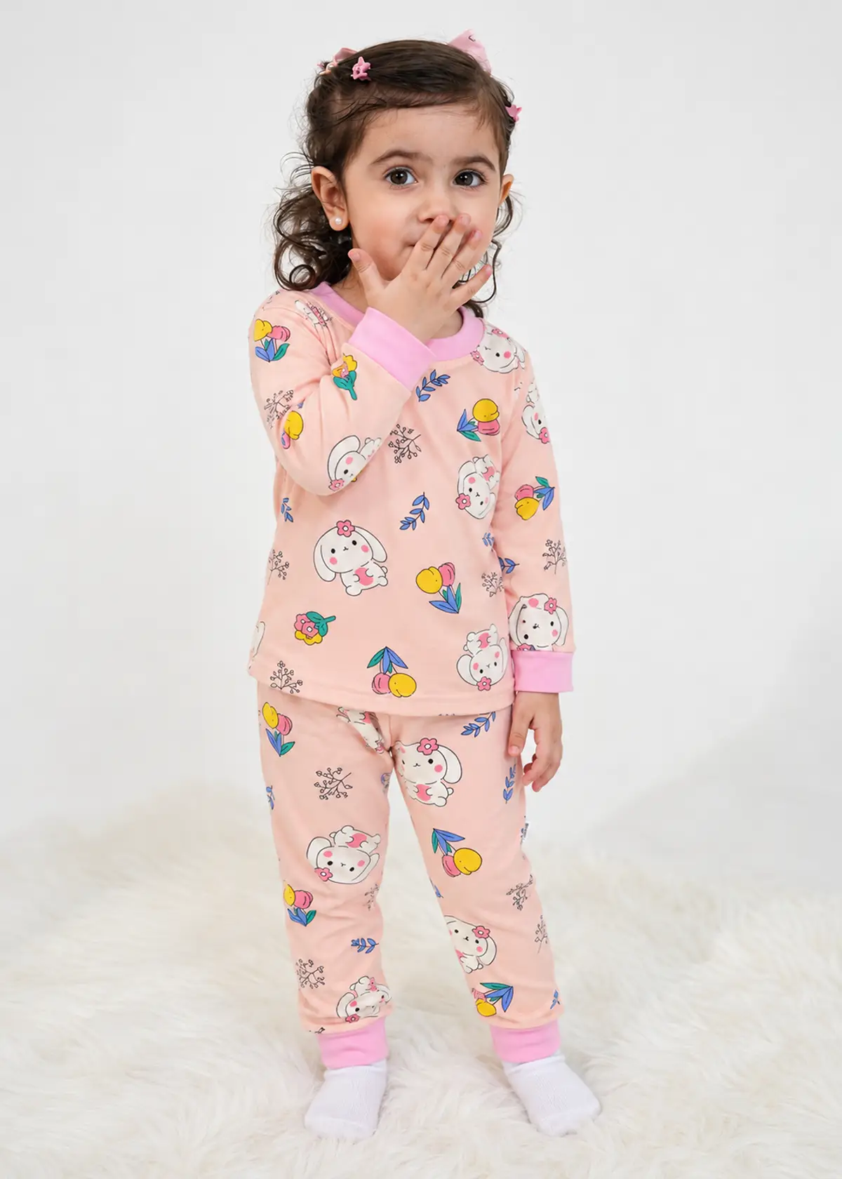 Girl wearing Bunny Blossom Fleece Nightwear, pink fleece set