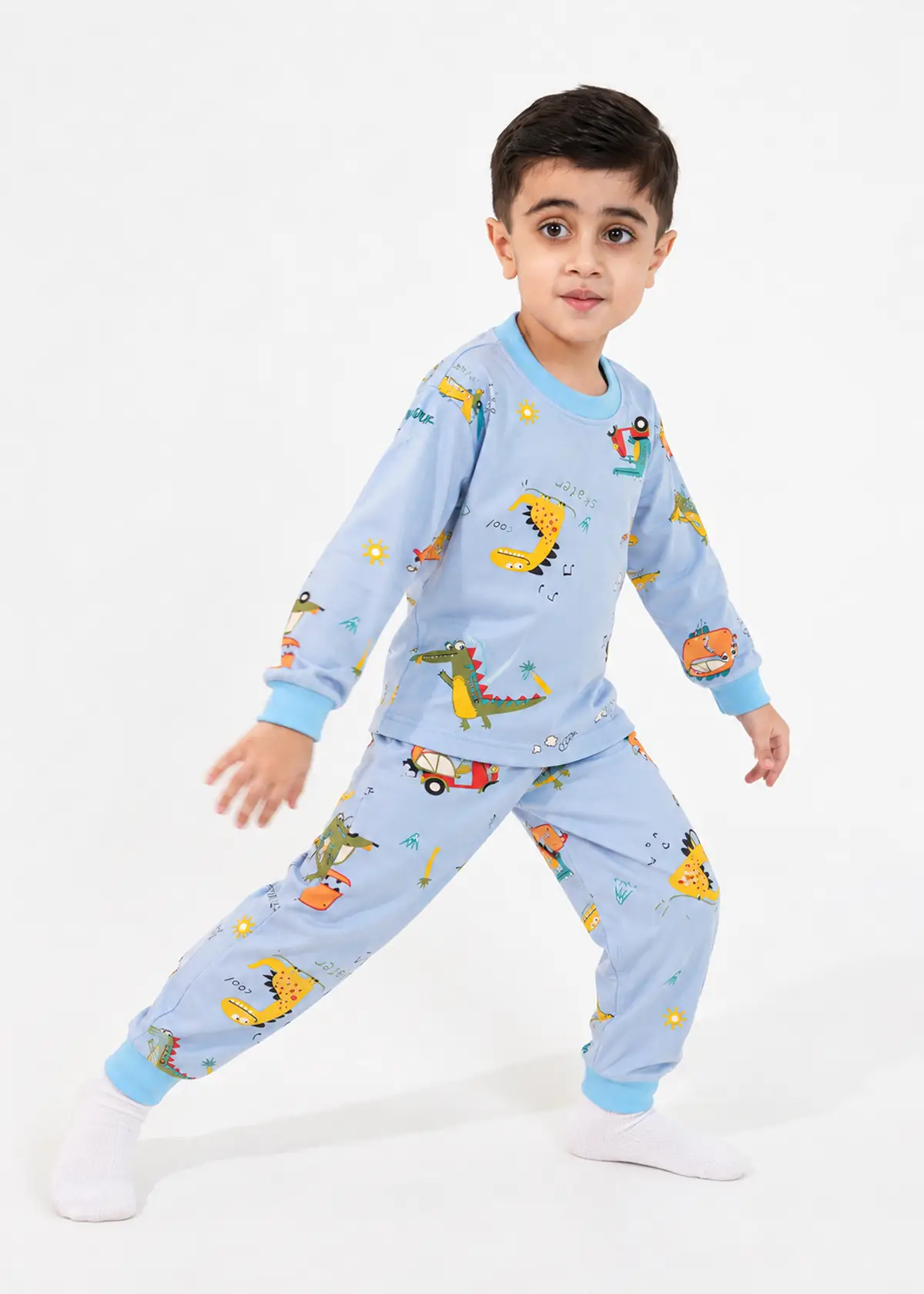 Boy wearing Dino Explorer Fleece Nightwear, blue fleece set