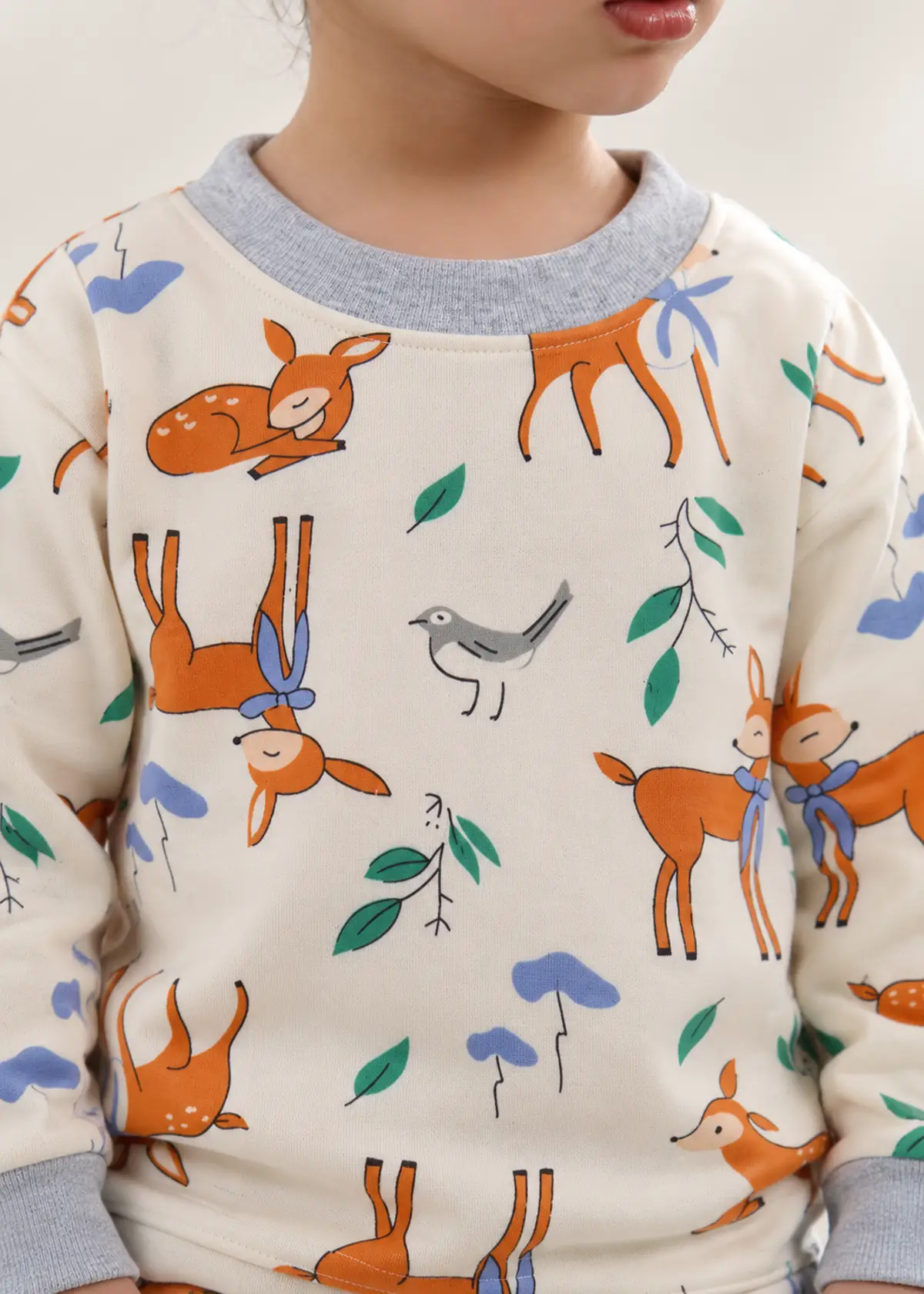 Little Deer Fleece Nightwear print close up, deer, birds and leaves