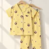 Lemon Princess half sleeve nightwear for girls, yellow top and pants with princess print on hangers