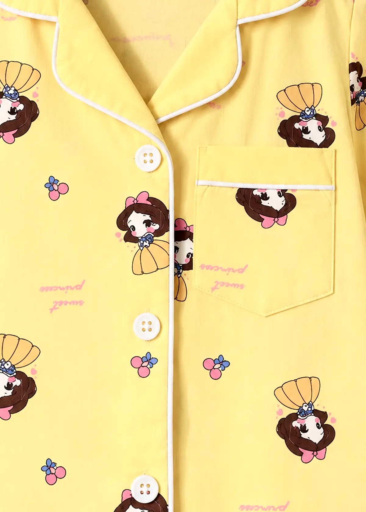 Lemon Princess half sleeve nightwear close up, yellow collar, white piping and princess print
