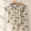 Little Builder half sleeve nightwear for boys, grey top and pants with construction truck print on hangers