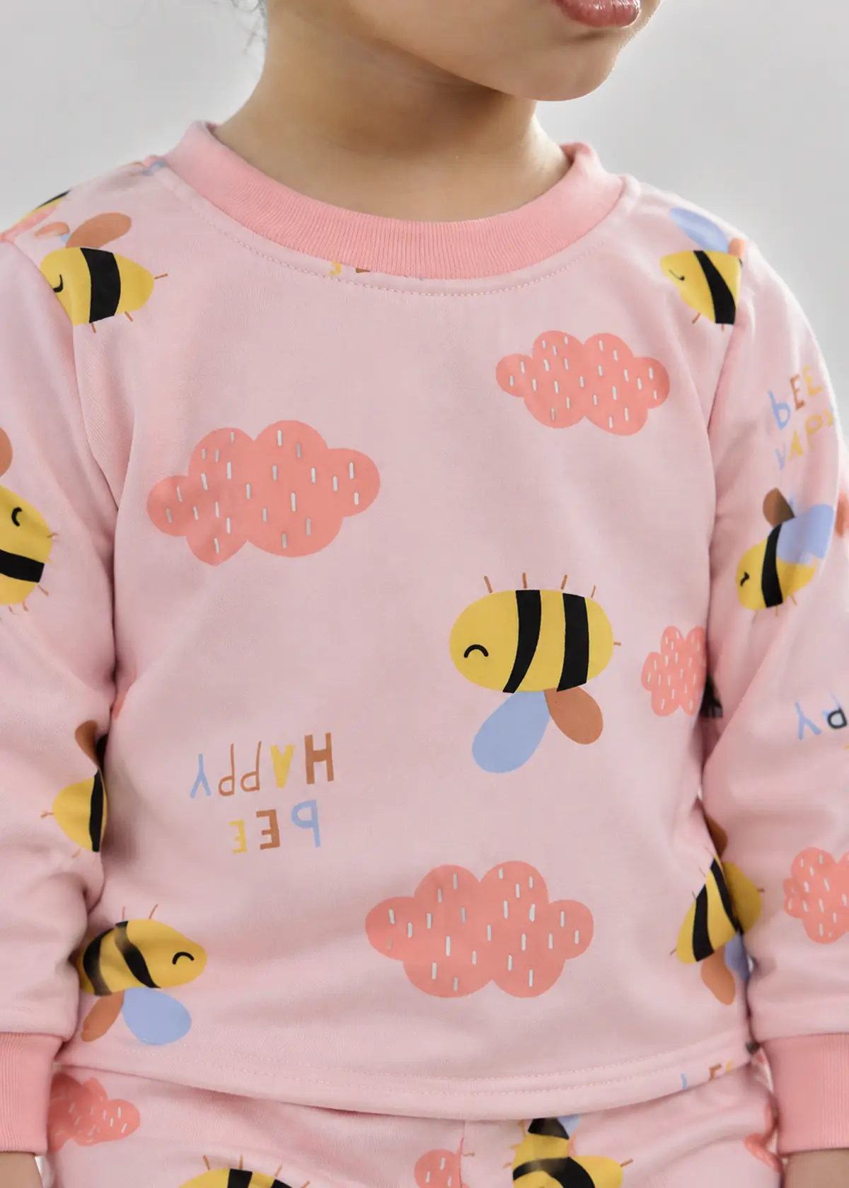 Snuggly Bee Nightwear print close up, bees and clouds
